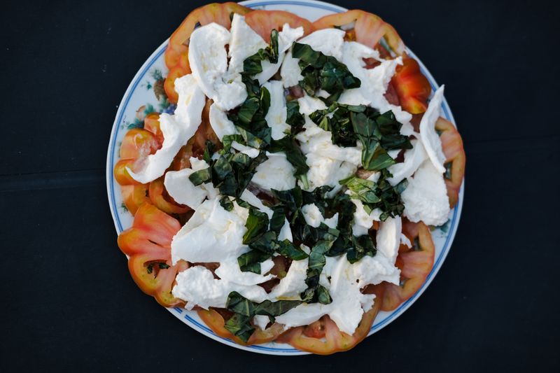 Caprese salad with fresh tomatoes mozzarella and basil